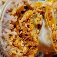 Chorizo Burrito · Scrambled egg with Mexican sausage, with cheese, beans, and rice in a warm flour tortilla.