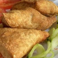 Samosa (Each) · Dough turnovers with filling.