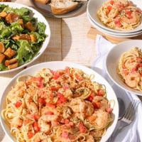 New!  Family Bundle Scampi Pasta With Shrimp · Roasted shrimp in a garlic scampi sauce, topped with fresh tomatoes over linguini. Includes ...