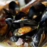 Mussels Josephine® · Tomatoes, red onion, garlic, basil and lemon wine sauce