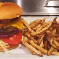 Lumberjack Burger · Brioche bun, spicy mayo, lettuce, tomato, onion, fries.