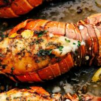 Lobster Tails · Two main lobster tails , mashed potaoes melted butter roasted vegetables.