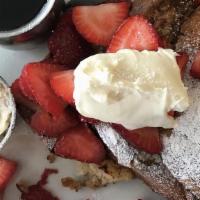French Toast · 4 triangles of French toast topped with our Marion-berry preserve and sweet cream with a sid...