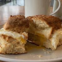 Biscuit Sandwich · Honey butter glazed buttermilk biscuit topped with fried egg and Swiss cheese. Add bacon or ...