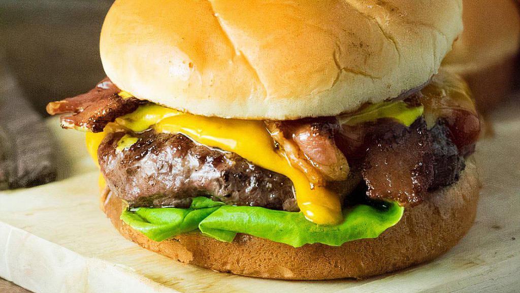 Bacon Cheeseburger (Combo) · ¼ lb beef, bacon, american cheese, lettuce, tomato, pickle, onion, mayo, mustard, ketchup. Extra patty and jalapenos for an additional cost.