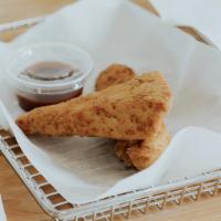 Chicken Strips · Two large chicken tenders, honey dipped donut, and choice of sauce.