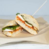 Caprese Sandwich · Ciabatta bread, fresh mozzarella, sun dried tomato spread, garlic aioli basil.
