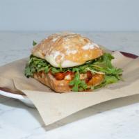 Vegetarian Sandwich · Ciabatta bread, smoked mozzarella, sweet peppers, hot peppers, arugula, parsley, olive oil, ...