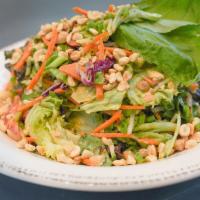 Thai Peanut And Basil Salad · Vegetarian, Gluten-free. Cabbage, red leaf lettuce, carrots, bell pepper, cilantro, basil, m...