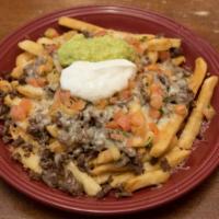 Carne Asada Fries · French fries topped with carne asada meat, melted jack cheese or nacho cheese, pico de gallo...