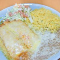 Enchiladas · Two corn tortillas rolled and stuffed with jack cheese, your choice of chicken or beef, and ...