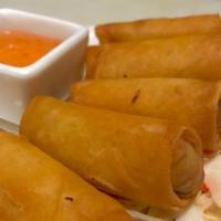 Spring Rolls · Crispy vegetable rolls served with sweet plum sauce.