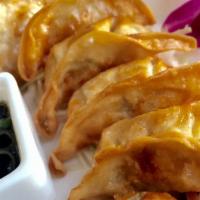 Pot Sticker (Pork) · Pork and vegetable dumpling deep-fried in the classic tradition. Served with vinaigrette soy...