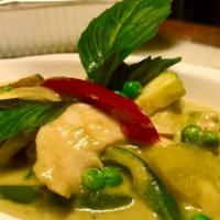 Green Curry · Green curry paste with coconut milk, zucchini, bell pepper, green peas, eggplant and sweet b...