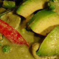 Green Curry With Avocado · Green curry paste with avocado, coconut milk, zucchini, bell pepper, eggplant, green peas an...