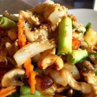 Golden Cashew · Sautéed meat with mushroom, carrots, scallions, bell peppers, pineapple and cashew nuts in a...