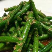 Garlic Green Beans · Sautéed meat with green beans with garlic in oyster sauce.