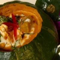 Pumpkin Curry · Season’s dish is fall personified. Red Thai curry with cube golden pumpkins, bell pepper, ho...