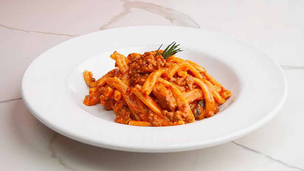 Strozzapreti Salsiccia · sausage, tomato sauce, cream, parmigiano, rosemary. Handcrafted in-house daily with imported italian semolina flour. Contains eggs (locally farmed).