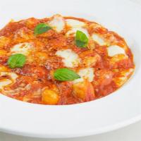 Gnocchi Sorrentina · tomato sauce, mozzarella, parmigiano, basil. Handcrafted in-house daily with imported italia...