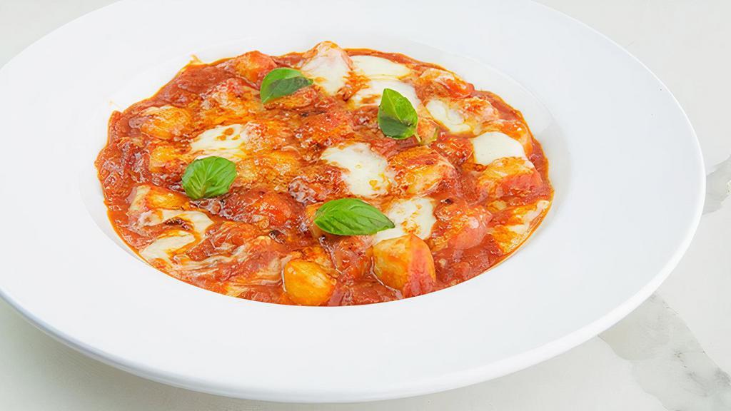 Gnocchi Sorrentina · tomato sauce, mozzarella, parmigiano, basil. Handcrafted in-house daily with imported italian semolina flour.