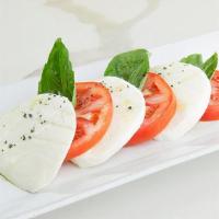 Caprese · mozzarella, tomato, fresh basil, evoo. GF. VEG.