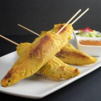 -Chicken Satay · Grilled chicken tenders marinated in herbs with curry powder and coconut milk. . Served with...