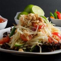 -Som Tum Thai · (Extra Moo Yor +$3)Traditional Thai salad with homemade lime dressing, shredded green papaya...