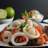 -Yum Seafood · Seafood (Shrimps, Calamari, Mussels, Scallops) with cherry tomatos, red onion, . cilantro, g...