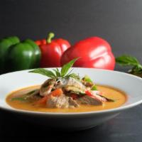 -Panang Curry · Smooth and creamy curry sauce with protien choice, coconut milk, bell pepper . and sweet Tha...