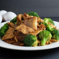 -Pad See Ew · Stir-fried wide rice noodles in homemade sweet soy sauce with egg and broccoli.