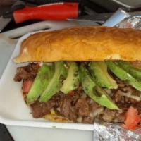 Asada Torta · Toasted and grilled torta, asada,
lettuce, tomato, mayo, mustard
Add  fries and soda for an ...