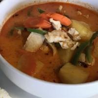 Red Pineapple Curry · A type of red curry with slightly sweet flavor, contain pineapple, carrot, and the protein o...