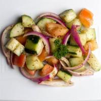 Cuto Salad · Gluten free, Vegan. Chopped cucumber, tomato, and onion tossed in chaat masala.