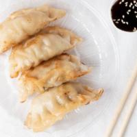 Grilled Potstickers  · Grilled Wontons pork & veggies served with a dipping of spicy soy sauce (3 potstickers in an...