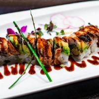 Dragon Roll · Tempura shrimp roll topped with grilled fresh water eel, avocado, sweet soy glaze