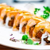 Salmon Lover'S Roll · Spicy salmon and cucumber topped with salmon, lemon slices and soy mustard dressing