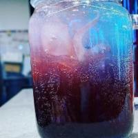 Summer Jams · A watermelon Red Bull with blackberry syrup and a splash of lemonade garnished with fresh bl...
