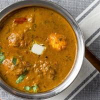 Egg Curry · Egg cooked with spicy Andhra spices made with spice mix.