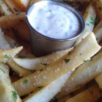 Truffle Fries · White truffle oil, grated parmesan, parsley, house remoulade.