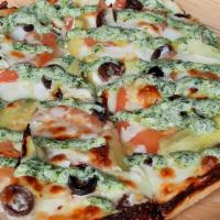 Puttanesca Pizza · Tomato, Marinated Artichoke, Kalamata Olives, Caper Pesto, Garlic, Feta Cheese, and Mozzarella