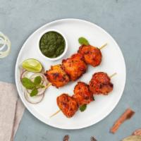 Chasing Chicken  Kebab · Boneless pieces of our chicken cubes marinated in a yoghurt and baked in a tandoor clay oven