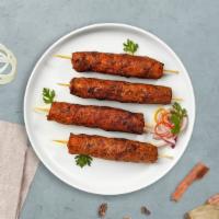 Shake It Up Sheekh Kebab · Ground meat seasoned with mint and herbs rolled on a skewer and baked in a tandoor clay oven