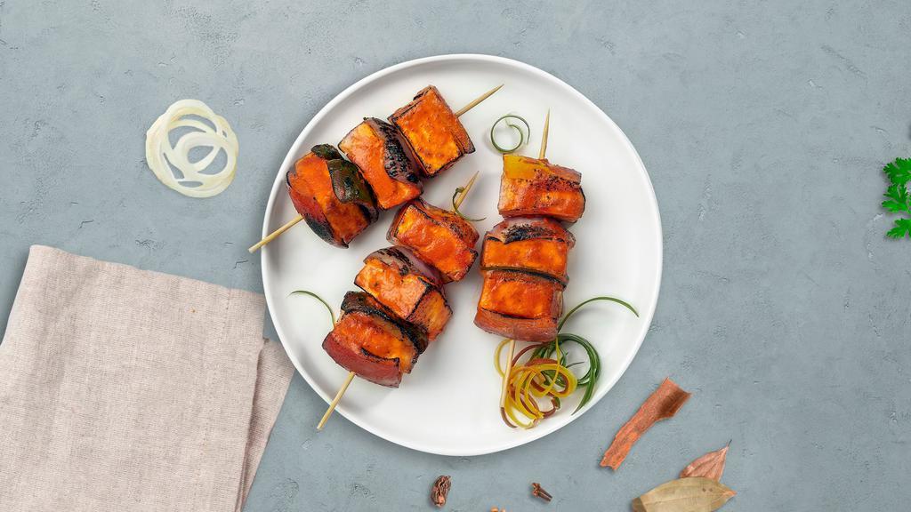 Paneer Parker Tikka · Fresh cubes of cottage cheese marinated in yoghurt and baked in a tandoor clay oven