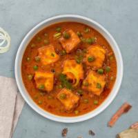 Martial Mata Paneer · Cubes of fresh cottage cheese and green peas cooked in a creamy tomato gravy.