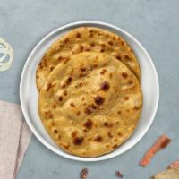 Terminator  Roti · Whole wheat Indian bread cooked in a clay oven.