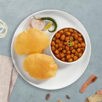 Bhatura Boomer · Deep fried bread with garbanzo beans.
