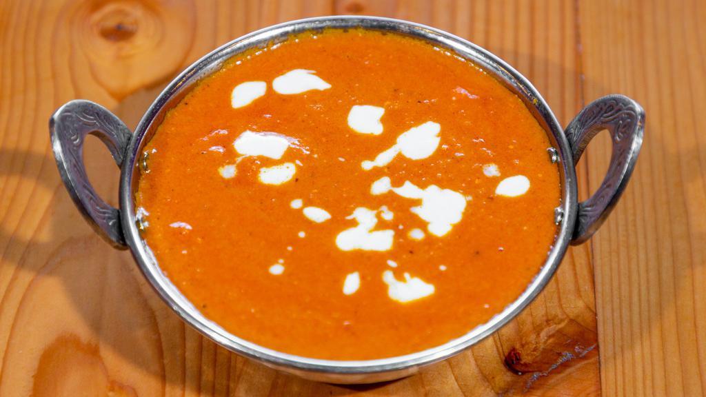 Chicken Tikka Masala · Chicken chunks cooked in the tandoor and then cooked in tomato cream sauce.