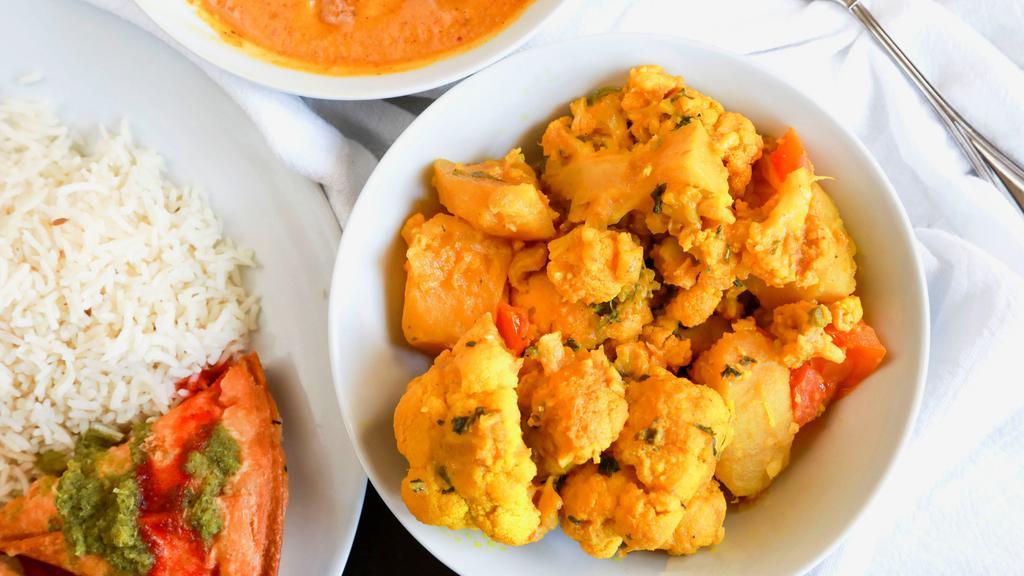 Alu Gobi · Cauliflower and potatoes cooked in delicate spices.