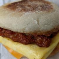 Breakfast Sandwich · English muffin, scrambled eggs, cheddar & bacon, spam, chicken patty or veggie sausage. Serv...